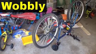 How To Straighten A Wobbly Bicycle WheelTutorial [upl. by Eyde]