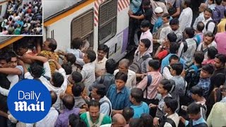 Train in Mumbai packed with commuters [upl. by Ahsaeit]