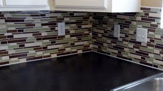 How to install a glass tile backsplash REAL DIY TIPS [upl. by Retsim174]